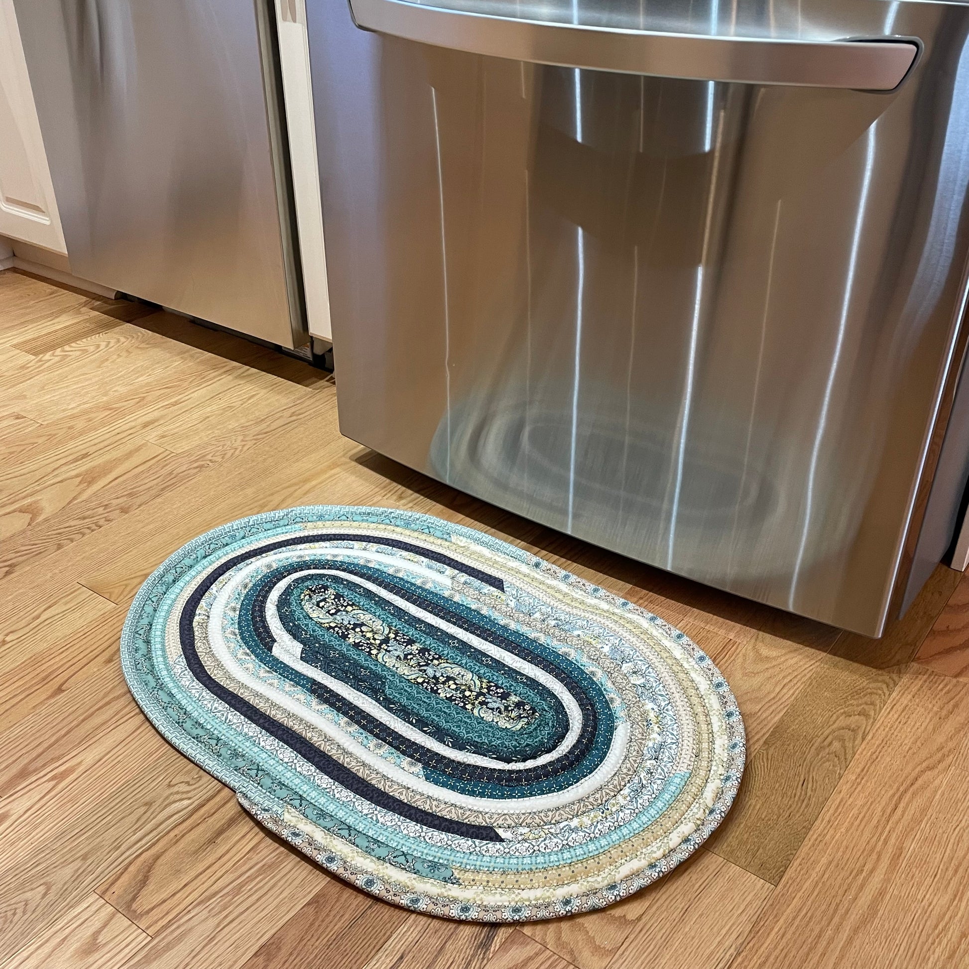 Farmhouse Kitchen Rug, Handmade Washable Kitchen Rug. Otherwise known as a Jelly Roll Rug our rugs are handmade in Canada.