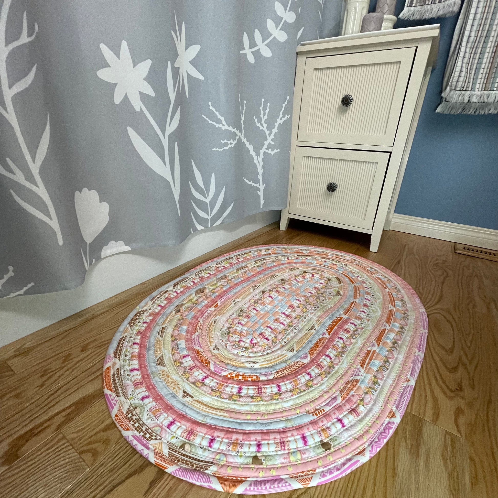 Handmade washable pink cotton Jelly Roll Rug for Kitchen, bedside or bathroom. Made in Canada