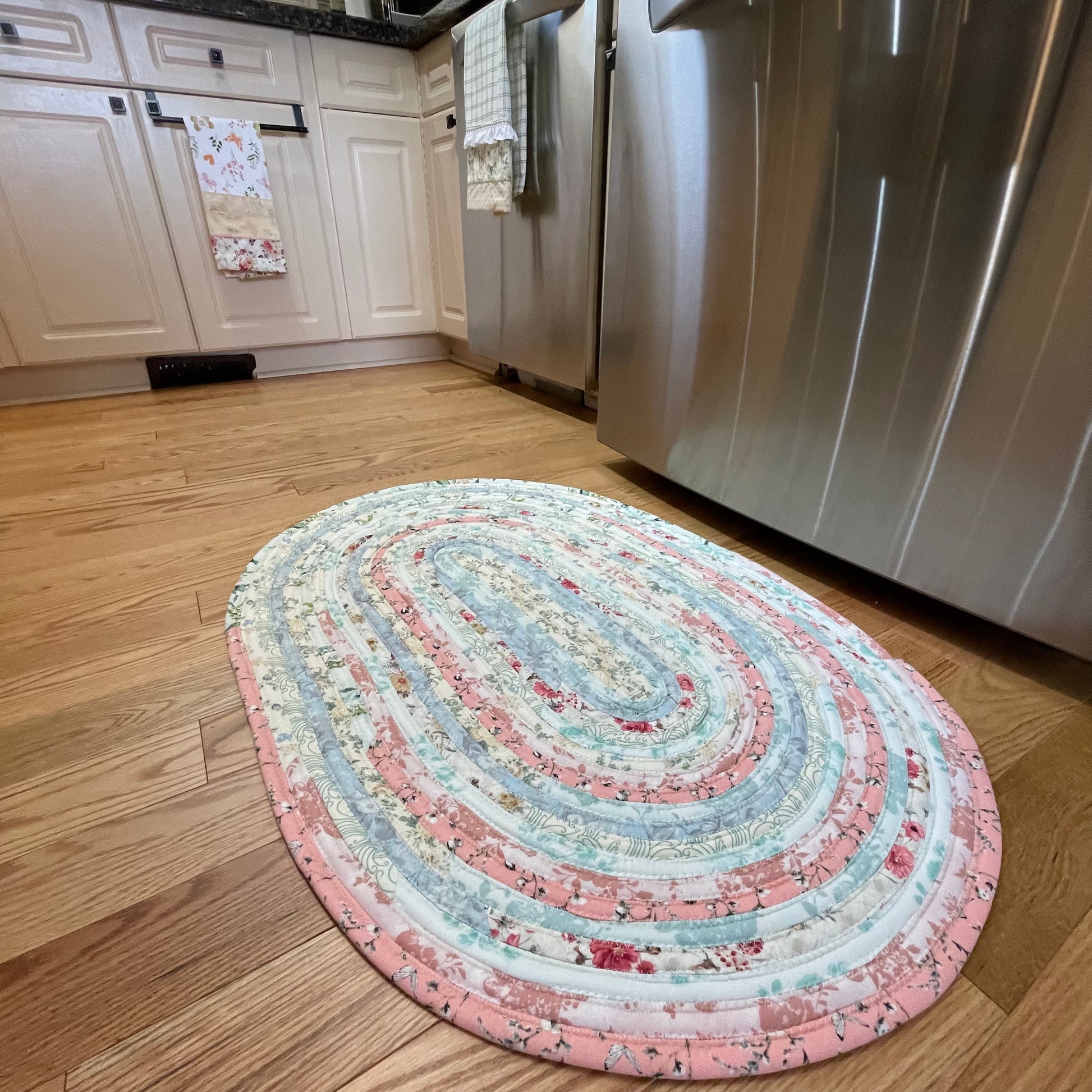 Handmade washable pink cotton Jelly Roll Rug for Kitchen, bedside or bathroom. Made in Canada