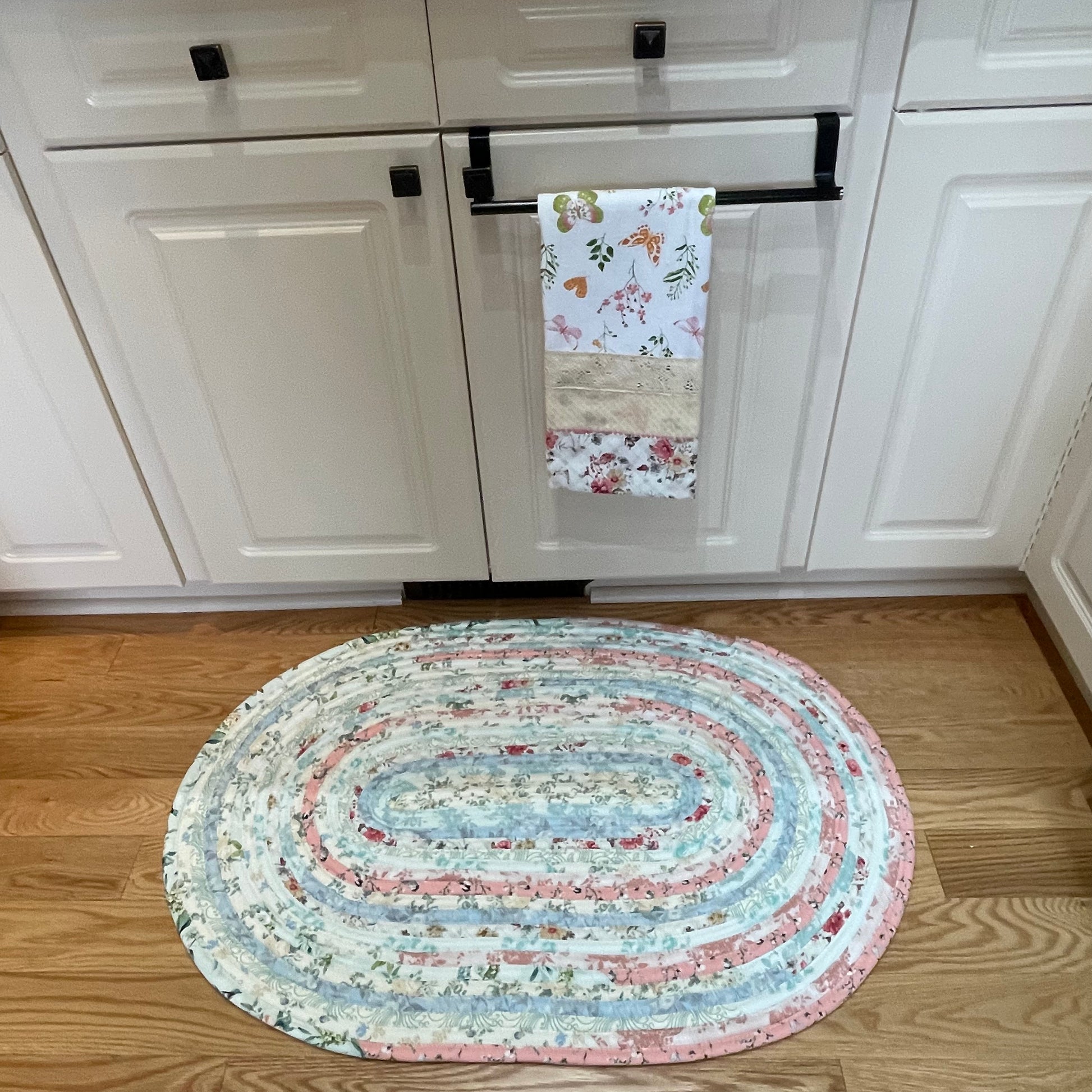 Handmade washable pink cotton Jelly Roll Rug for Kitchen, bedside or bathroom. Made in Canada