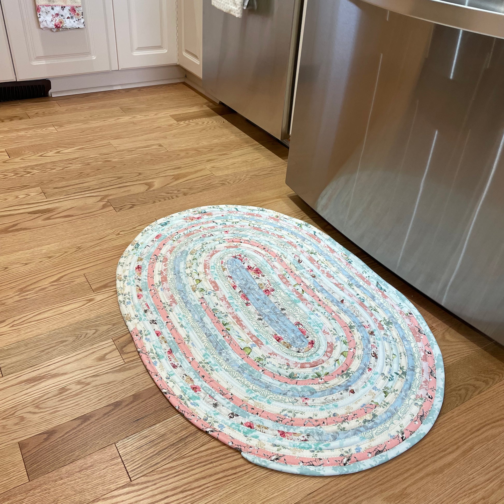 Handmade Cotton Jelly Roll Rug for Kitchen, bedside or use as a bathmat. Pink Cotton fabric. Made in Canada and Washable