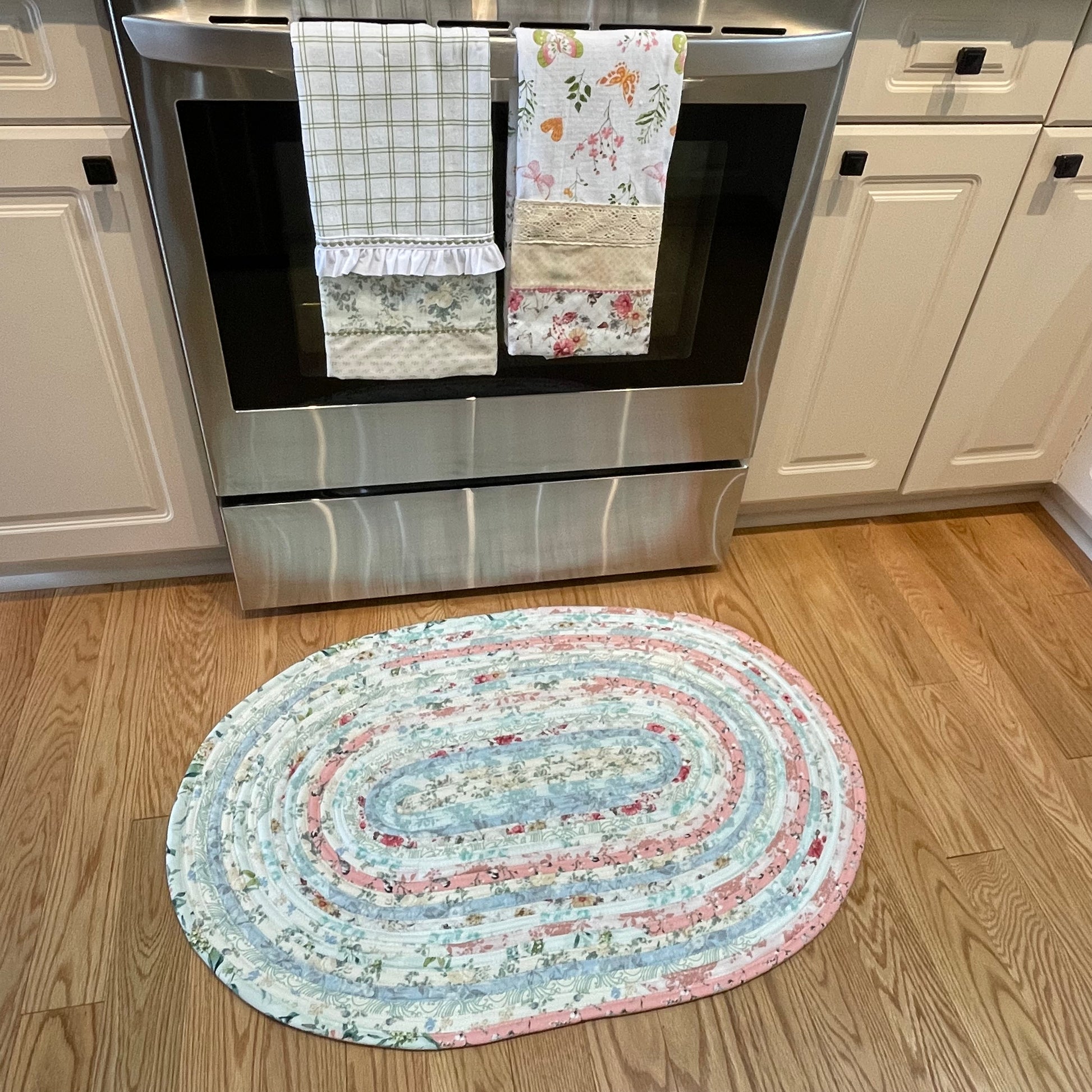 Handmade washable pink cotton Jelly Roll Rug for Kitchen, bedside or bathroom. Made in Canada